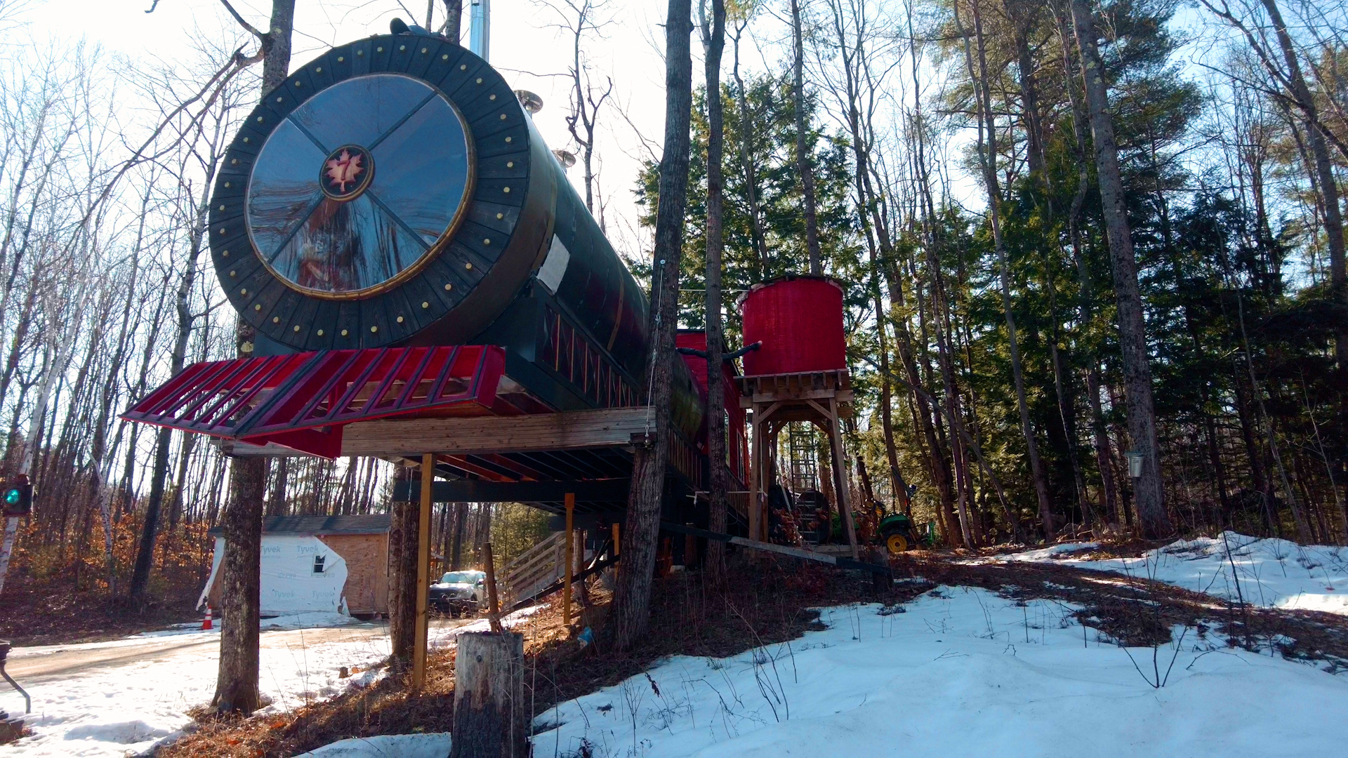 A train replica in the trees - where maple syrup is made